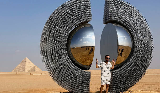 Monumental art displayed in shade of Egypt’s pyramids