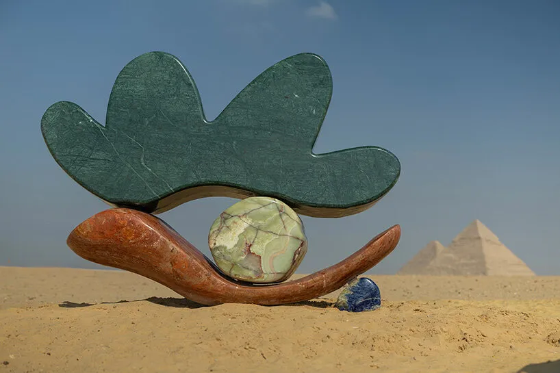 the forms were shaped to feel as though they had grown out of the desert floor